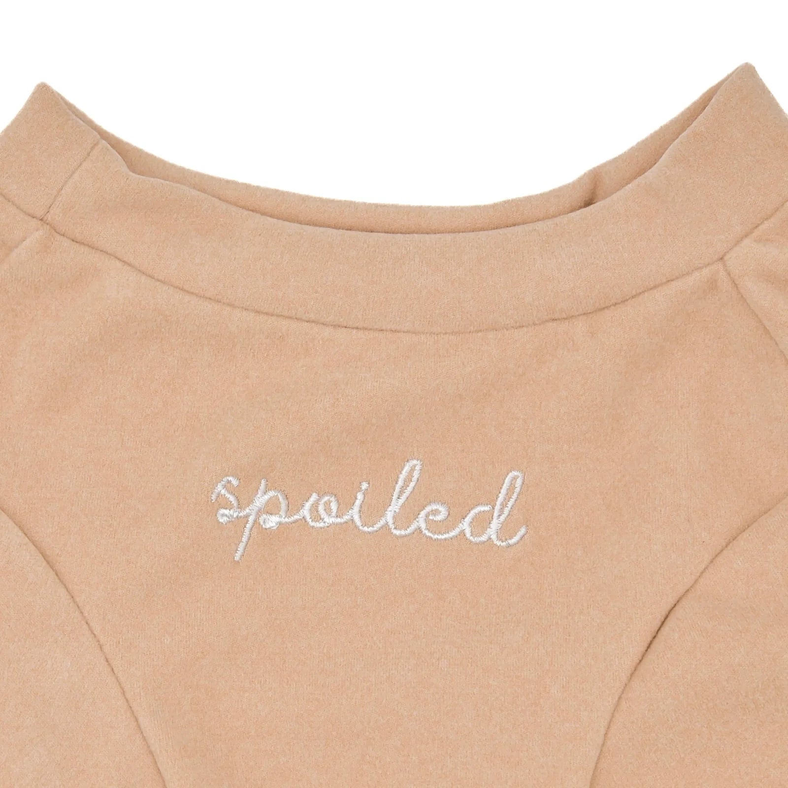 Soft latte fleece mock neck dog shirt featuring embroidered "spoiled" text. Perfect for stylish comfort.