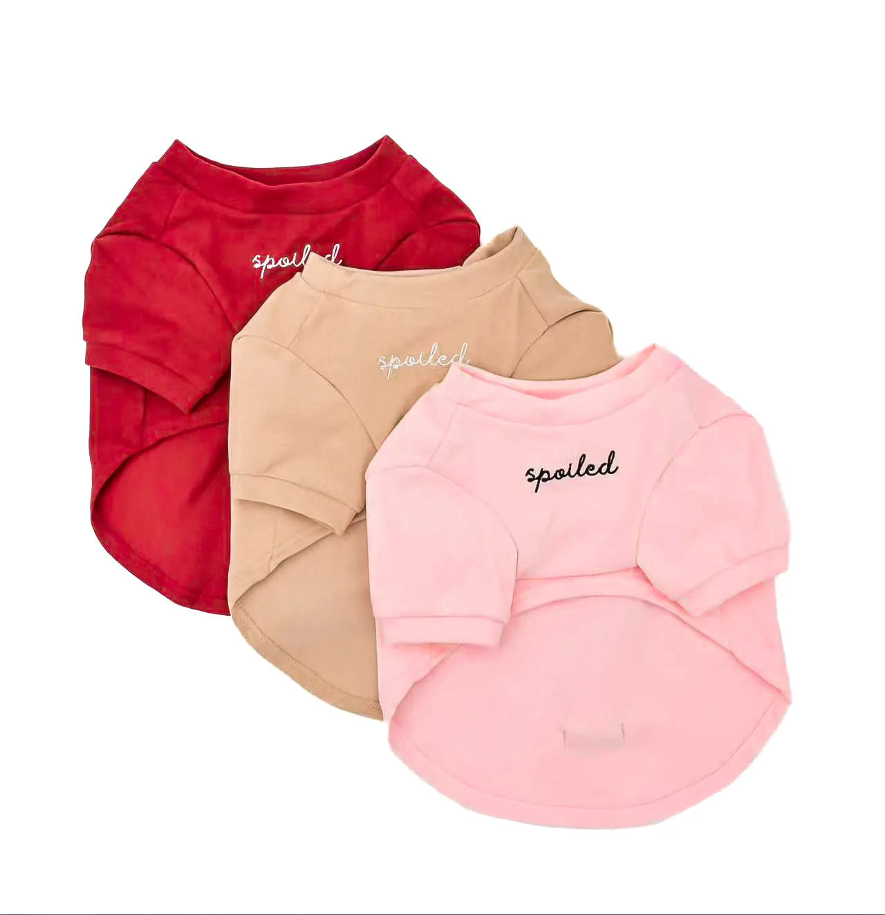 Three cozy fleece dog shirts in red, beige, and pink, featuring embroidered "spoiled" text, perfect for stylish pets.