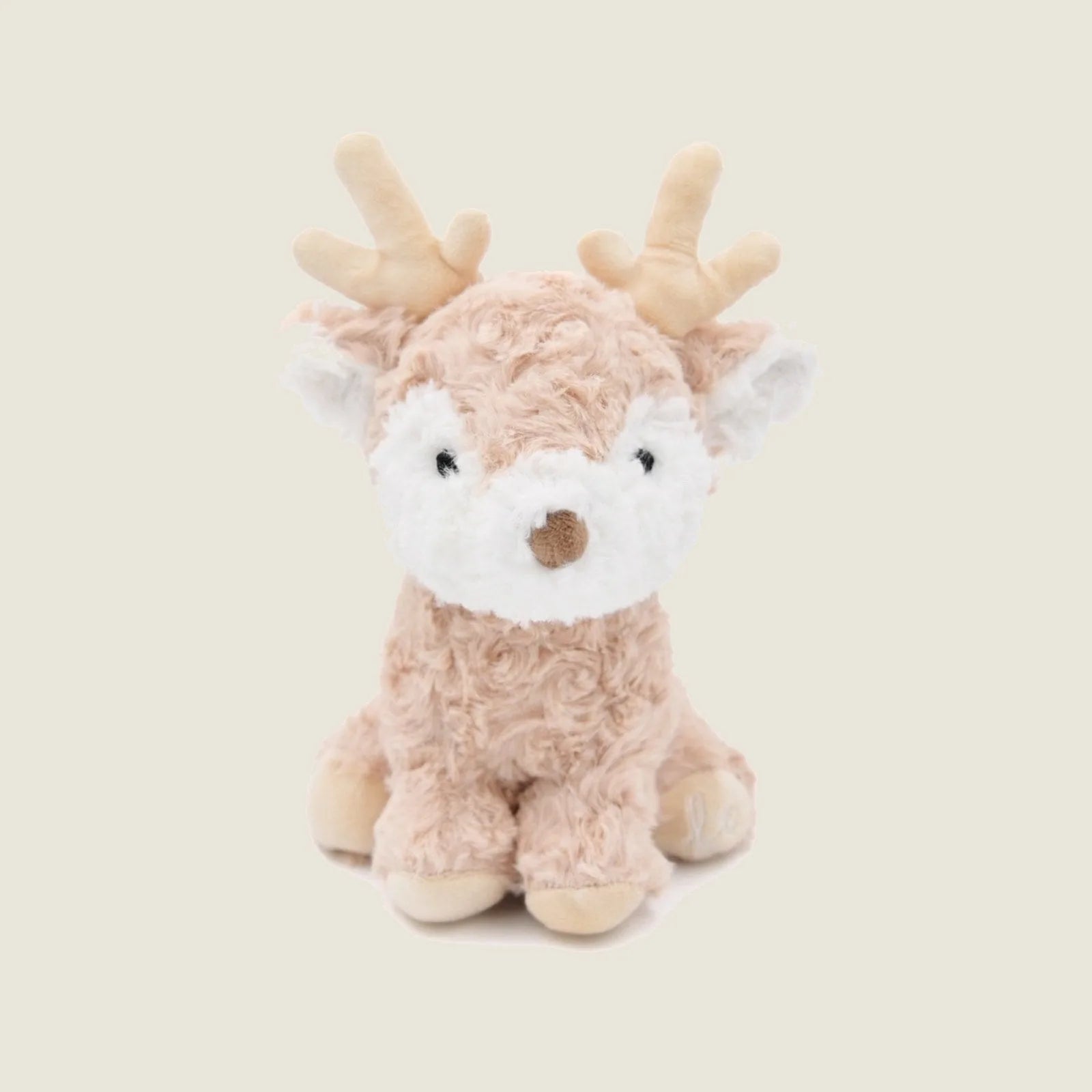 Soft plush Vixi the Reindeer toy with brown fur, white accents, and small antlers, perfect for gentle play and cuddling.