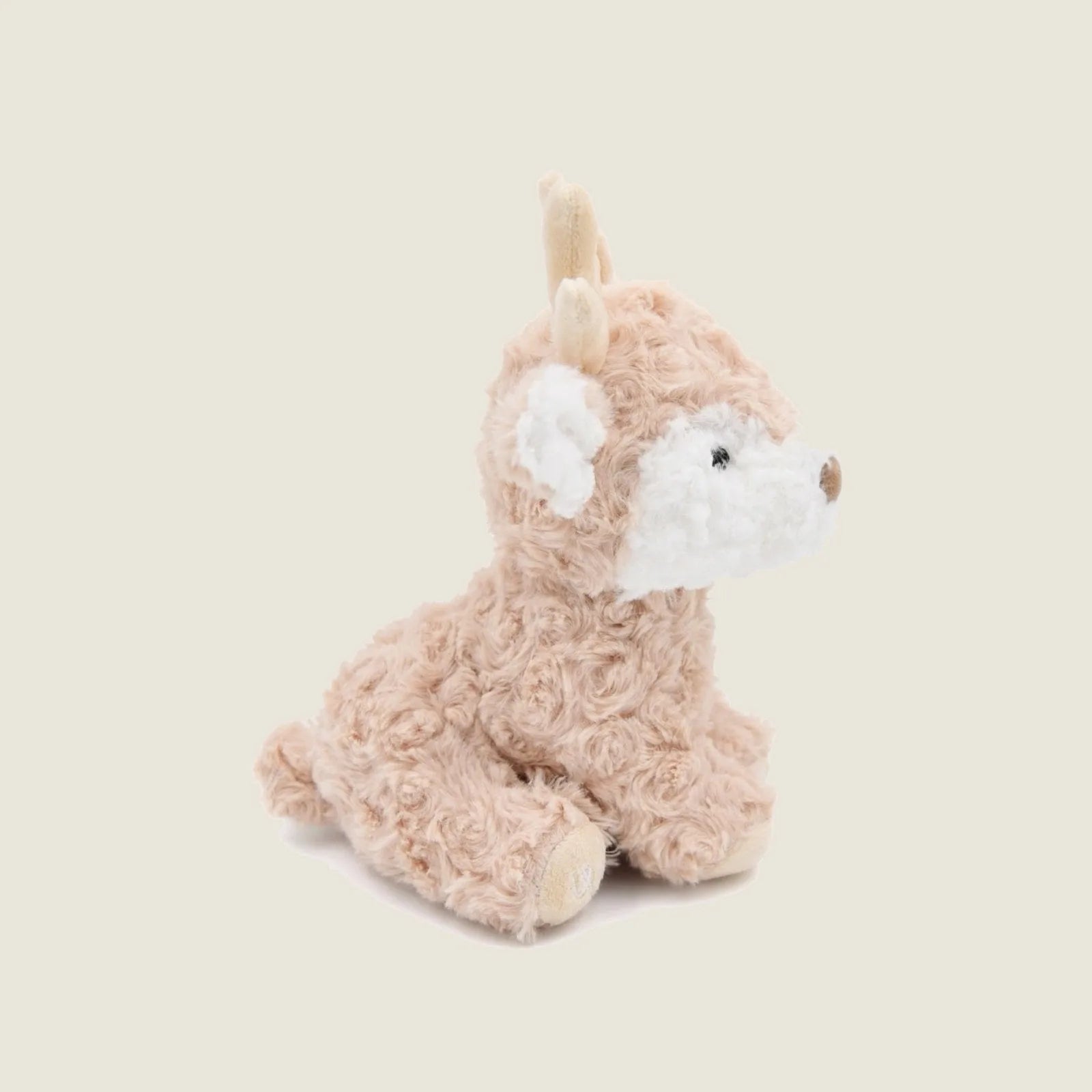 Soft beige plush reindeer toy with fluffy antlers and cuddly ears, perfect for gentle play and snuggles.