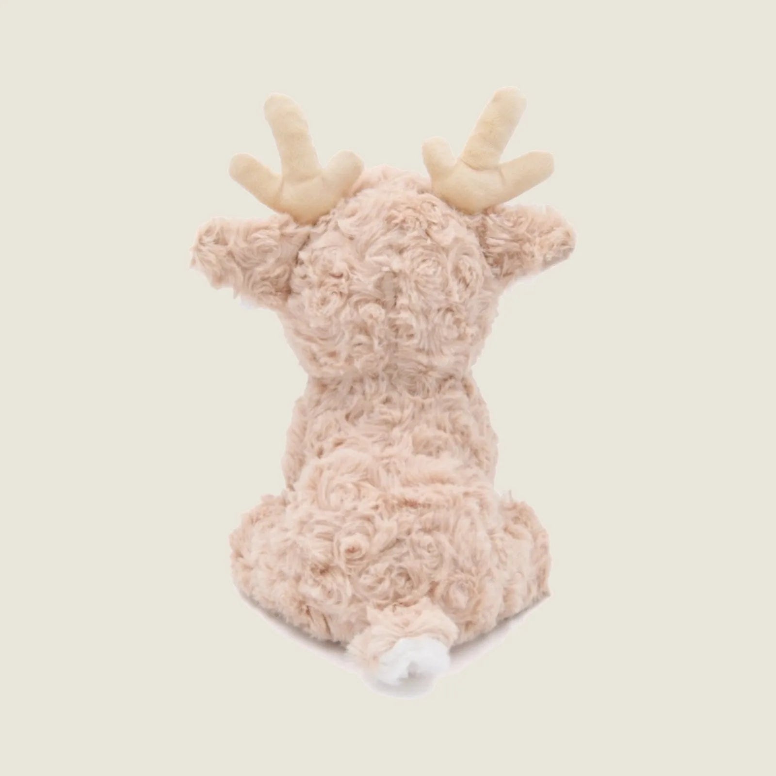 Soft beige plush reindeer toy with velvety antlers, ideal for gentle play and cuddling, featuring crinkly ears and a squea...