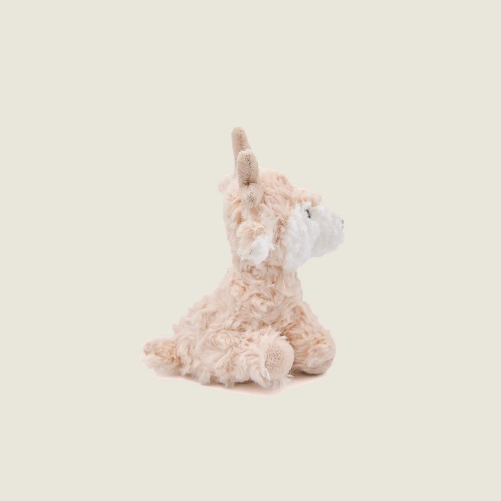 Soft plush Vixi the Reindeer toy in beige with antlers, perfect for dogs who love to cuddle and play.
