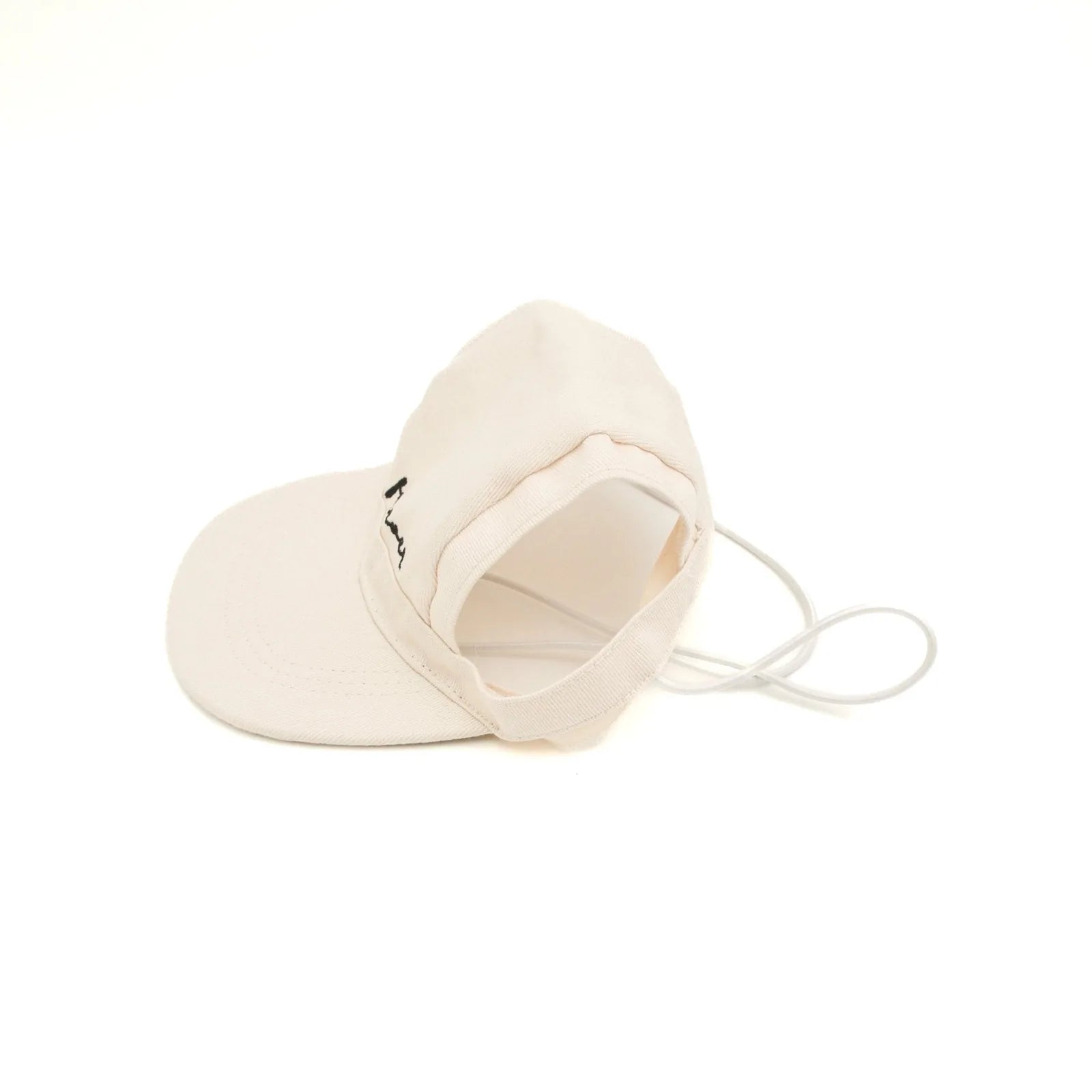 Lightweight beige pet hat with an embroidered 'furever' detail and adjustable nylon strap for a secure fit.