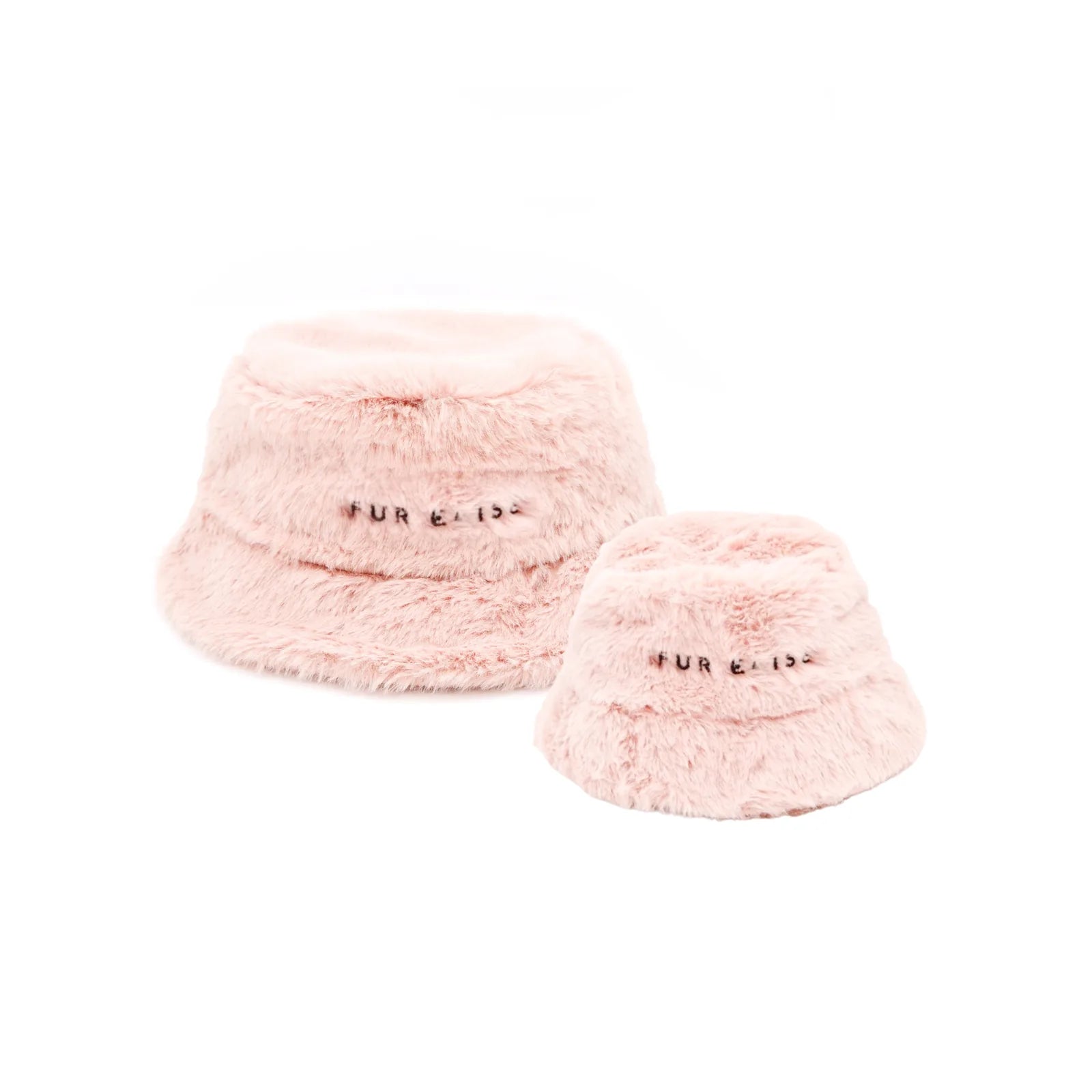 Soft rose faux fur bucket hats for adults and dogs, featuring embroidered logos, in a matching set.