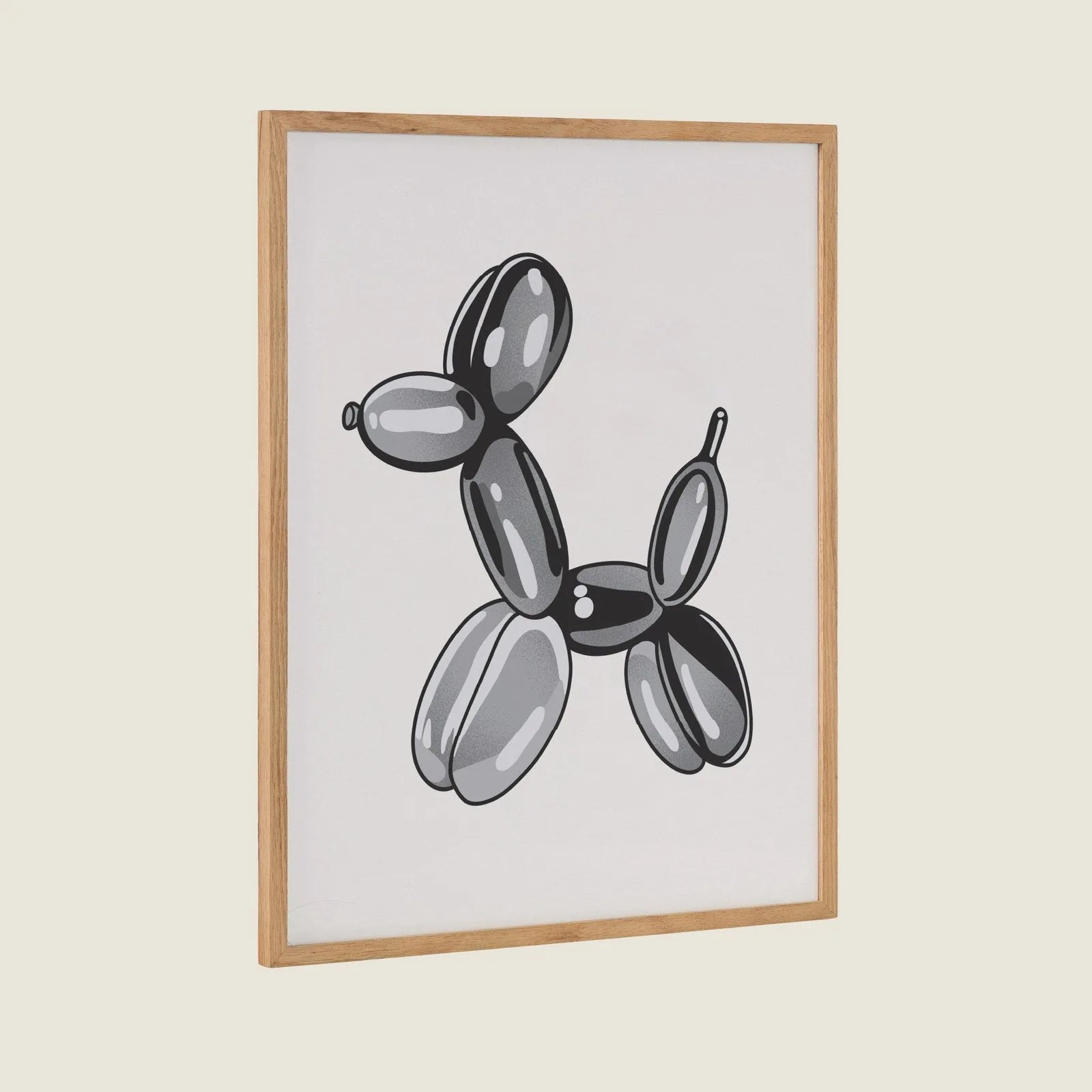 Framed art featuring a playful black balloon dog design, set in a natural wood frame against a light background.