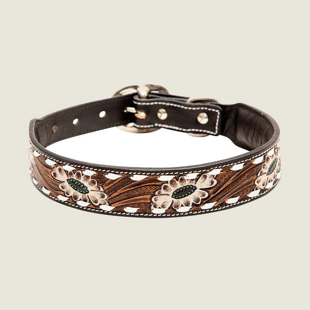 Hand-tooled leather dog collar with intricate floral design, featuring brown tones and white stitching.