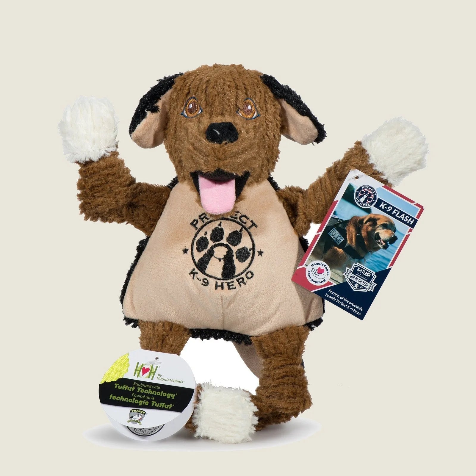Plush dog toy featuring K-9 Flash with a smiling face, soft brown fur, and playful knotted limbs for interactive play.