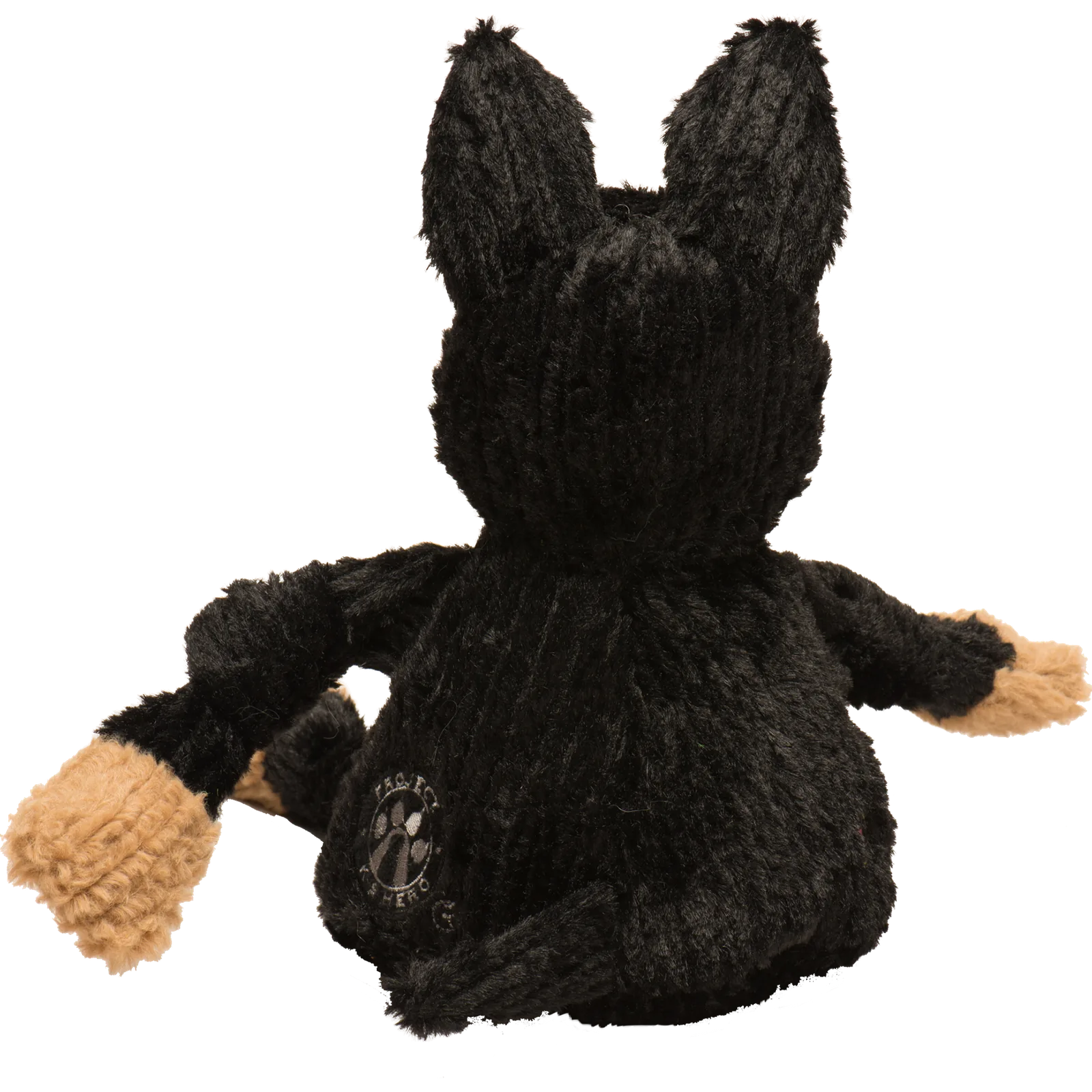 Large black plush dog toy with knotted limbs and tan paws, designed for interactive play and heavy chewers.