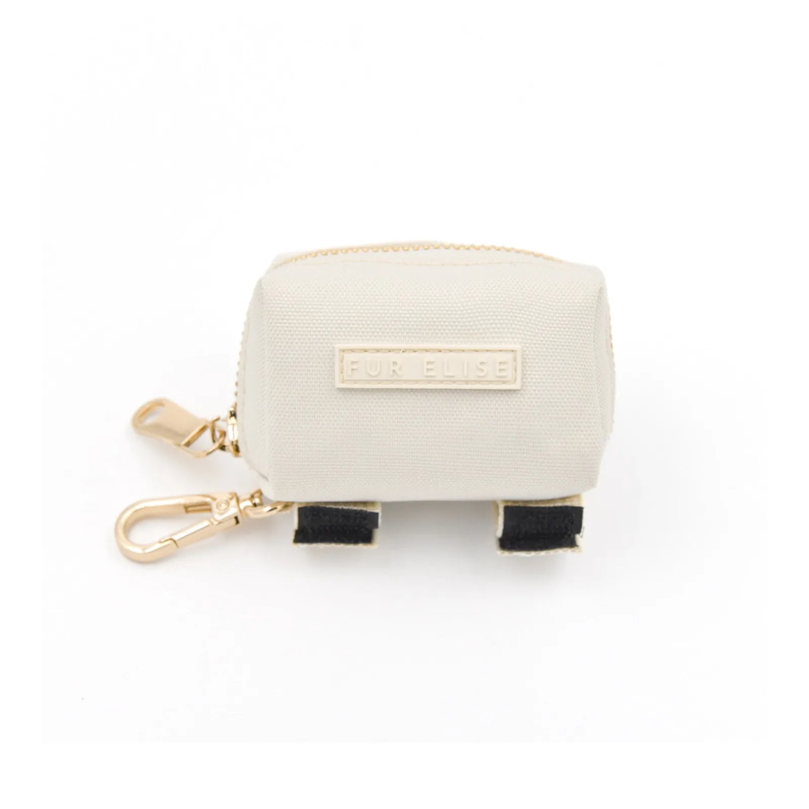 Light beige pet waste pouch made of durable fabric, featuring a gold clasp and Velcro attachments for easy carrying.