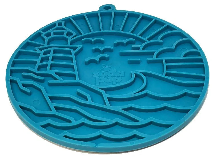 Dark blue lighthouse-themed enrichment lick mat with textured surface and suction cups for dogs and cats.