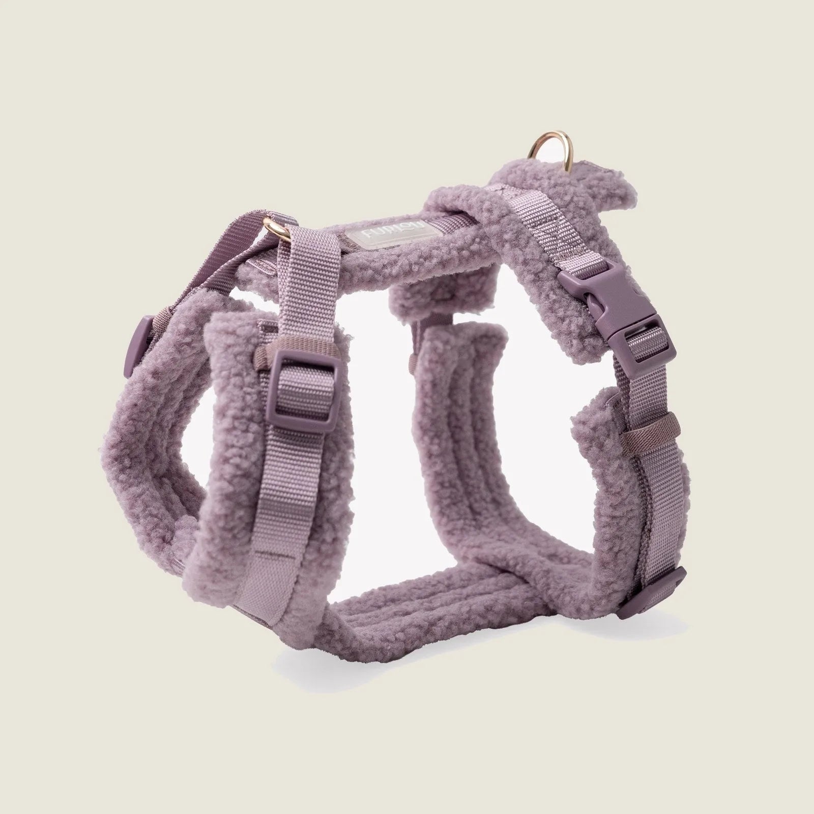 Lilac Sherpa dog harness featuring soft fabric, adjustable straps, and subtle gold details for comfort and style.