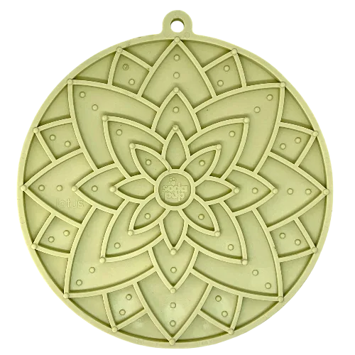 Pastel green lotus design lick mat with textured patterns for enriching pet feeding and mental stimulation.