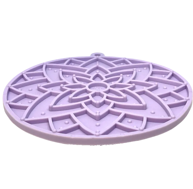 Pastel purple lotus-shaped lick mat with textured design for engaging feeding and enrichment for pets.