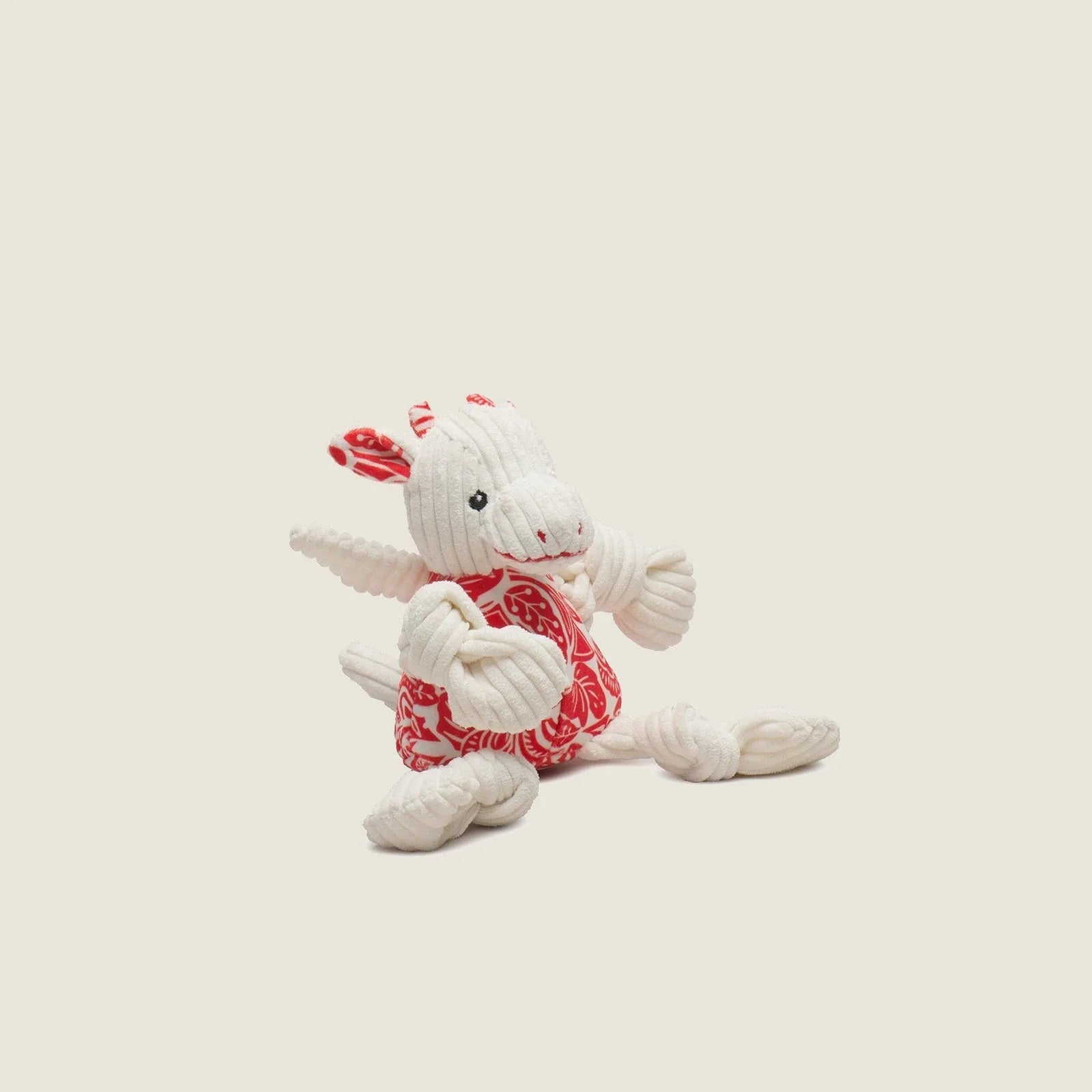 Lucky Dragon Knottie® plush dog toy in red and white, featuring soft corduroy, a dragon design, and multiple squeakers.