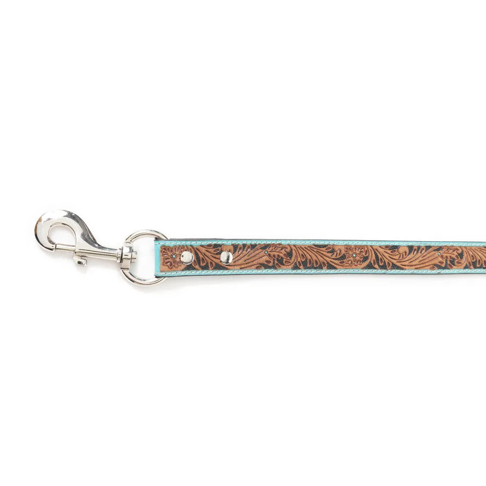 Turquoise leather dog leash featuring intricate floral embossing and premium silver hardware for a stylish finish.