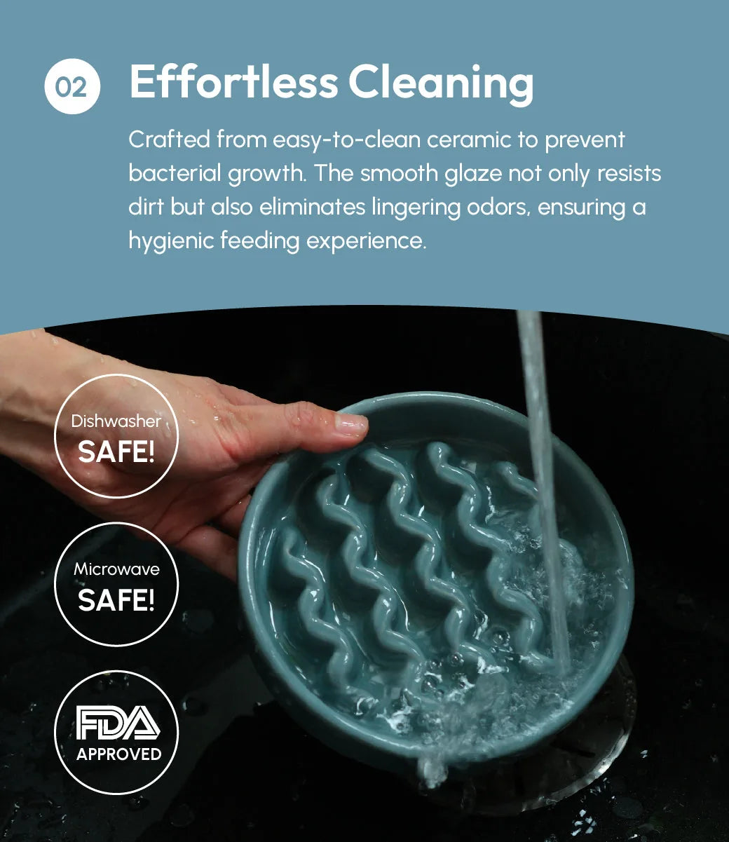 Ceramic slow feeder dog bowl in Frozen Blue being rinsed under water, featuring a wavy design for promoting slower eating.