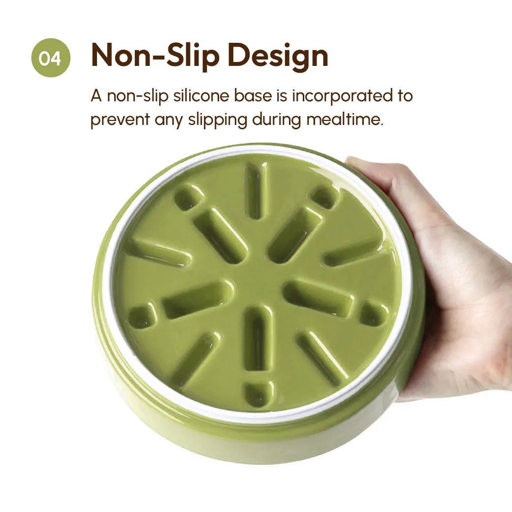 Yellow slow feeder dog bowl with a non-slip silicone base, designed to prevent slipping during mealtime.