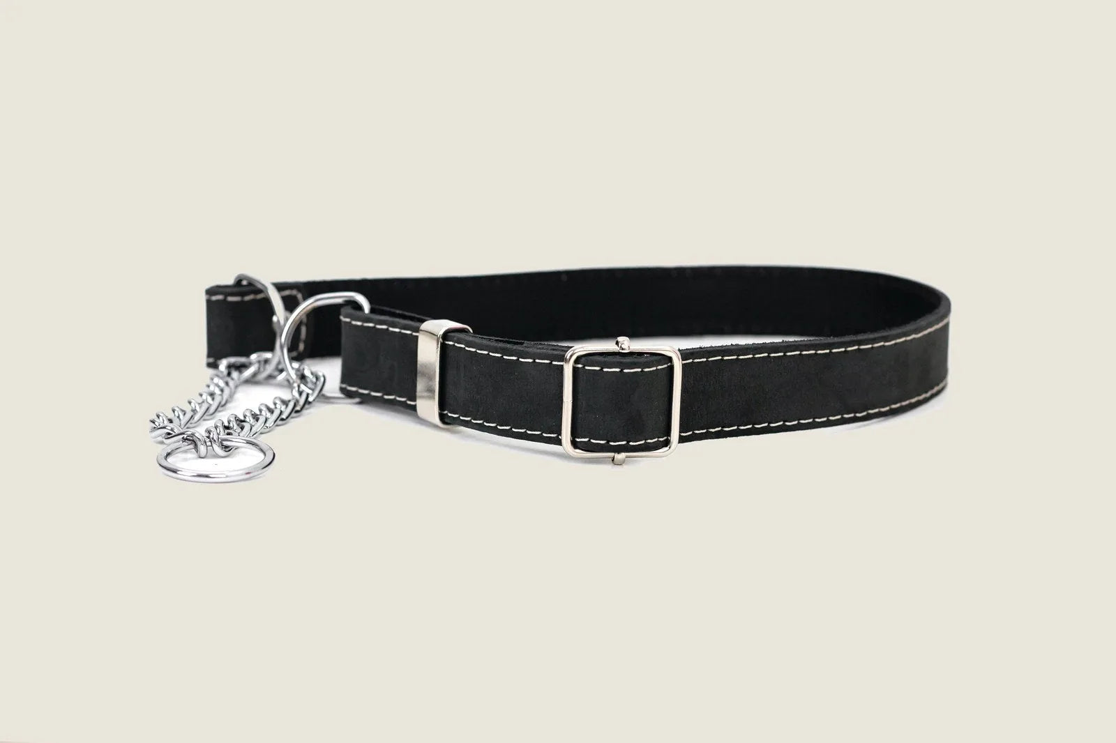 Martingale Midnight Black Leather Dog Collar with white stitching and silver hardware, designed for comfort and durability.