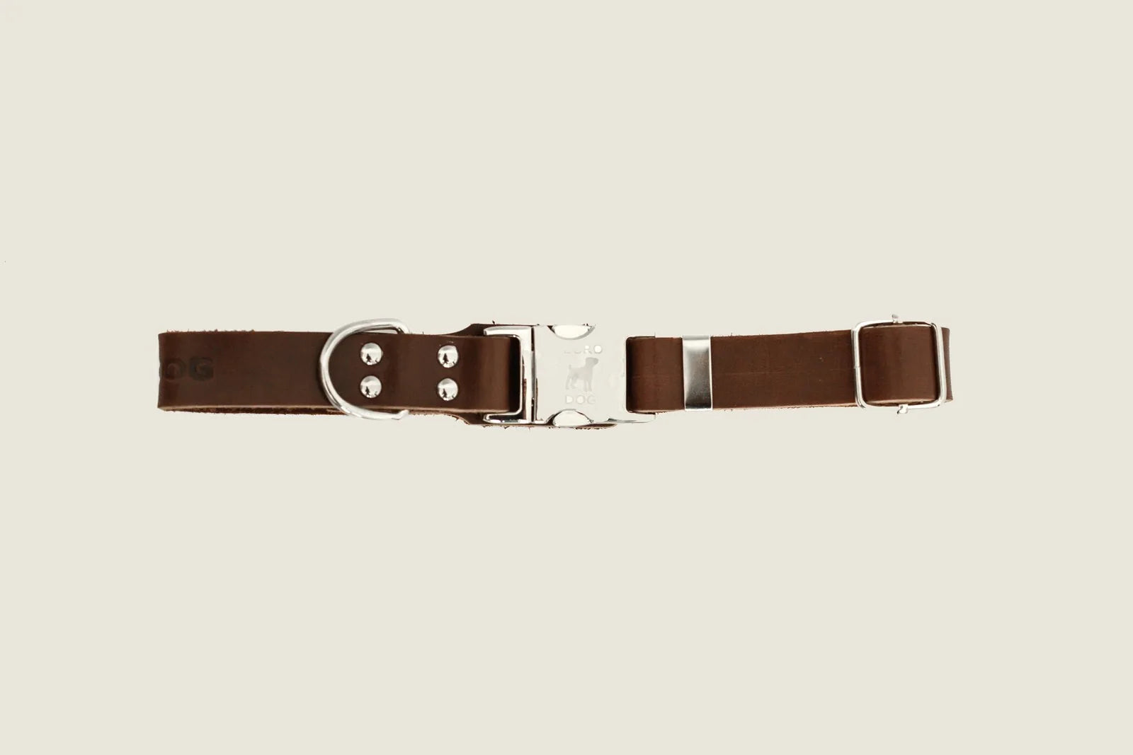 Chocolate leather dog collar featuring silver hardware and a quick-release buckle, designed for comfort and style.