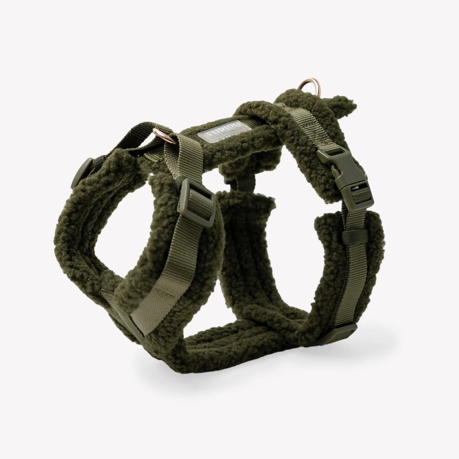 Moss green sherpa dog harness with adjustable straps and soft fluffy lining for comfort and style.