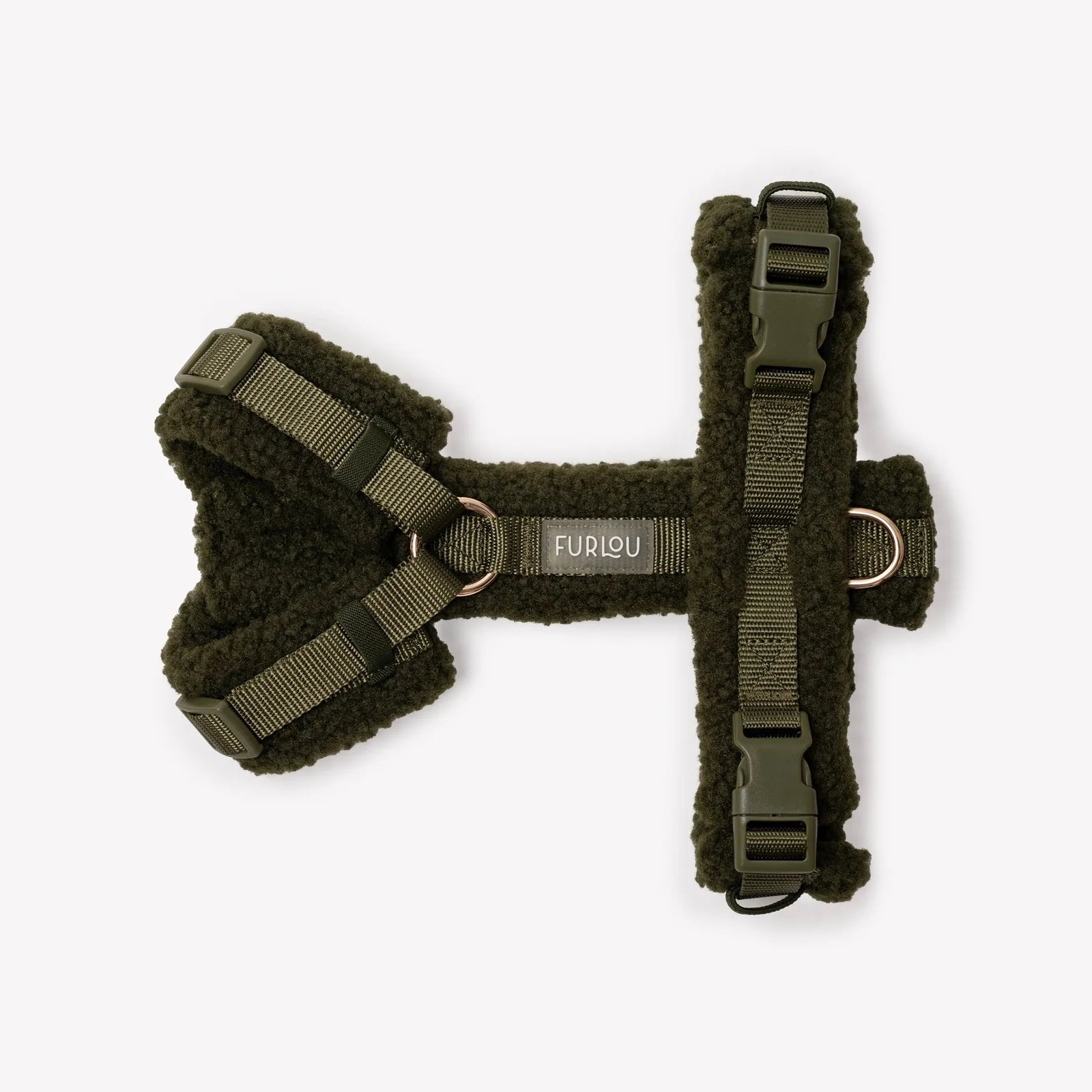 Moss green sherpa dog harness with adjustable straps and soft lining, designed for comfort during walks.