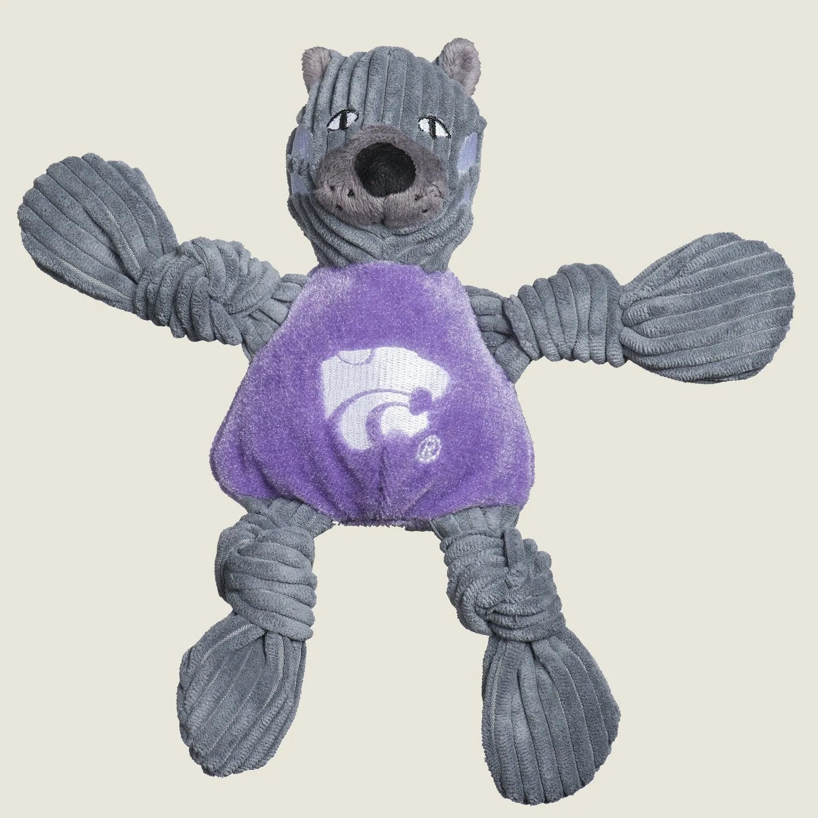 Gray and purple Willie the Wildcat plush dog toy with knotted limbs and a Kansas State logo, designed for durable play.
