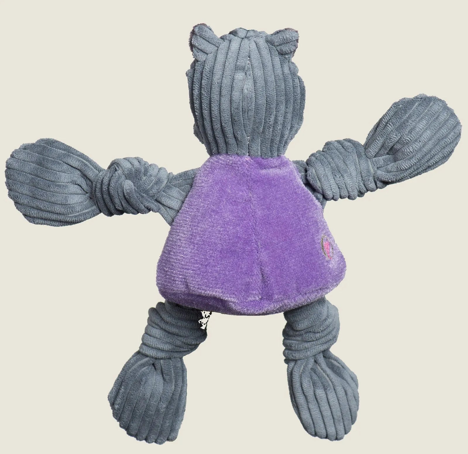 Gray and purple Willie the Wildcat plush dog toy with knotted limbs and textured corduroy fabric for playful tugging.