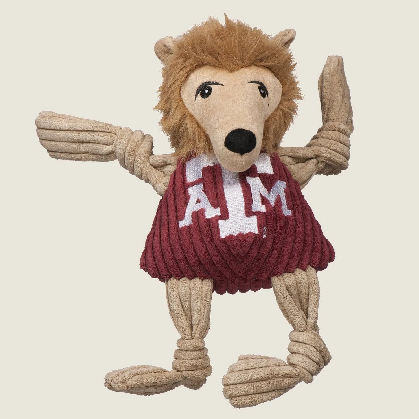 Texas A&M plush dog toy featuring a lion mascot with knotted limbs, soft fabric, and a maroon shirt displaying "A&M."