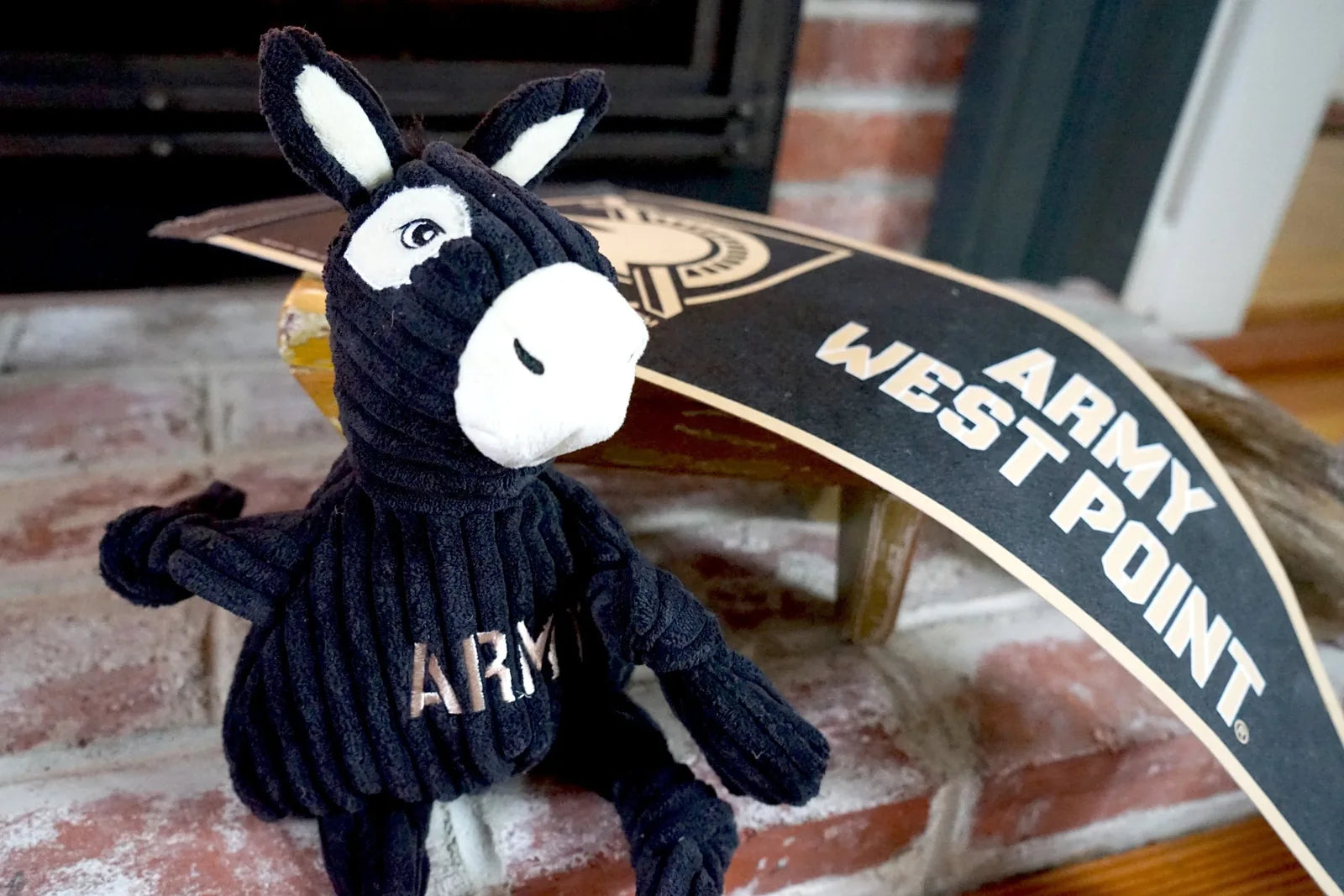 NCAA U.S. Military Academy Army Mule plush dog toy with knotted limbs, black corduroy, and 'ARMY' text, perfect for intera...