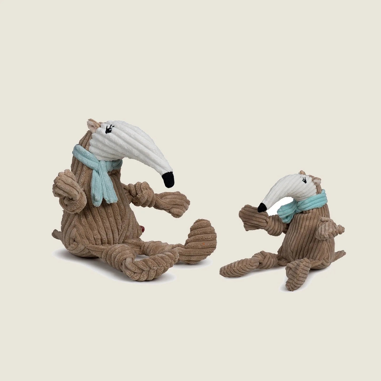 Plush Nibblet Anteater Knottie® dog toy, large, featuring knotted limbs and a long nose with a cozy fabric design.