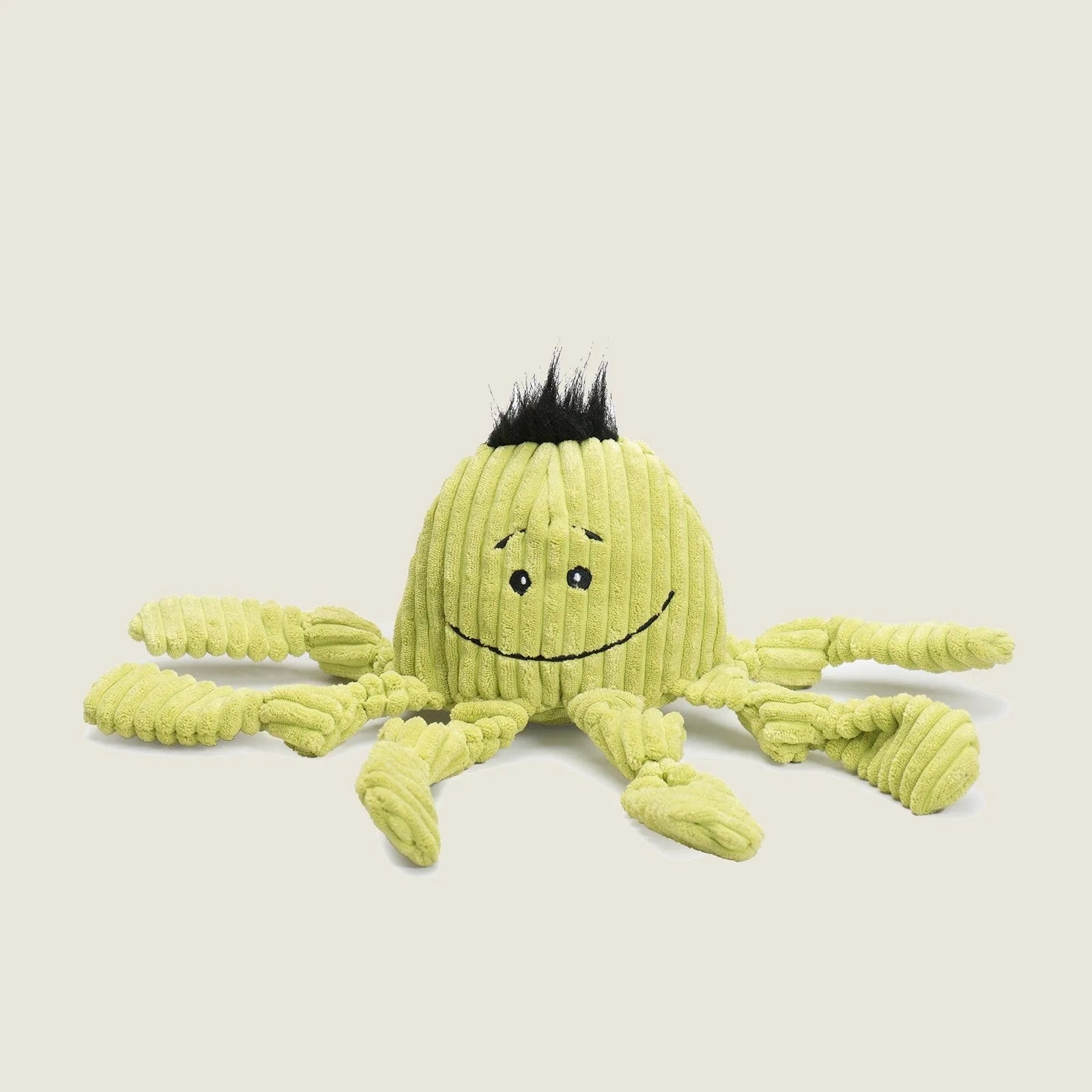 Bright green Octavie Octopus plush dog toy with knotted limbs, smiling face, and soft, ribbed texture.
