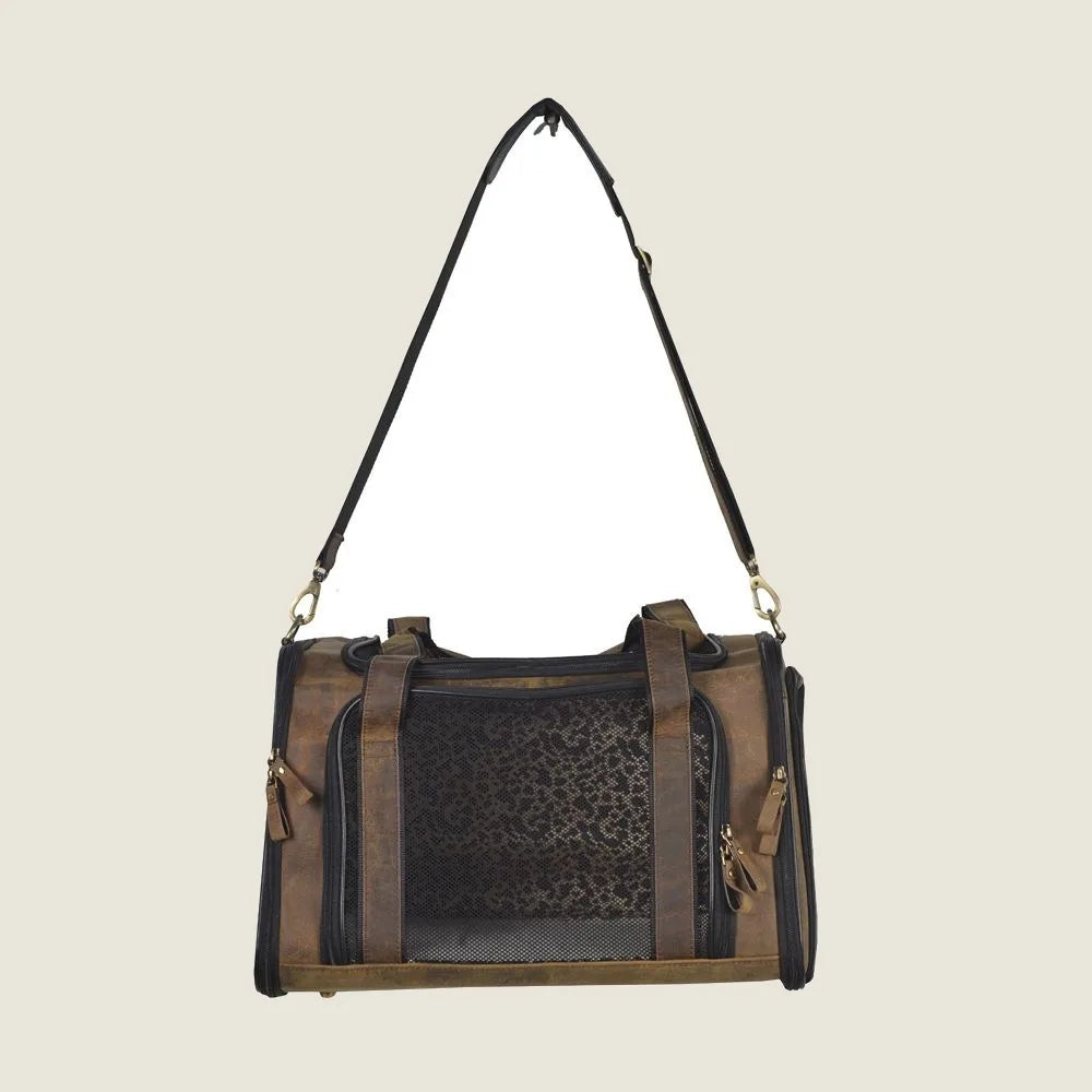Odin Leather Dog Bag by Myra USA, featuring dark brown leather with a leopard print design and adjustable shoulder strap.