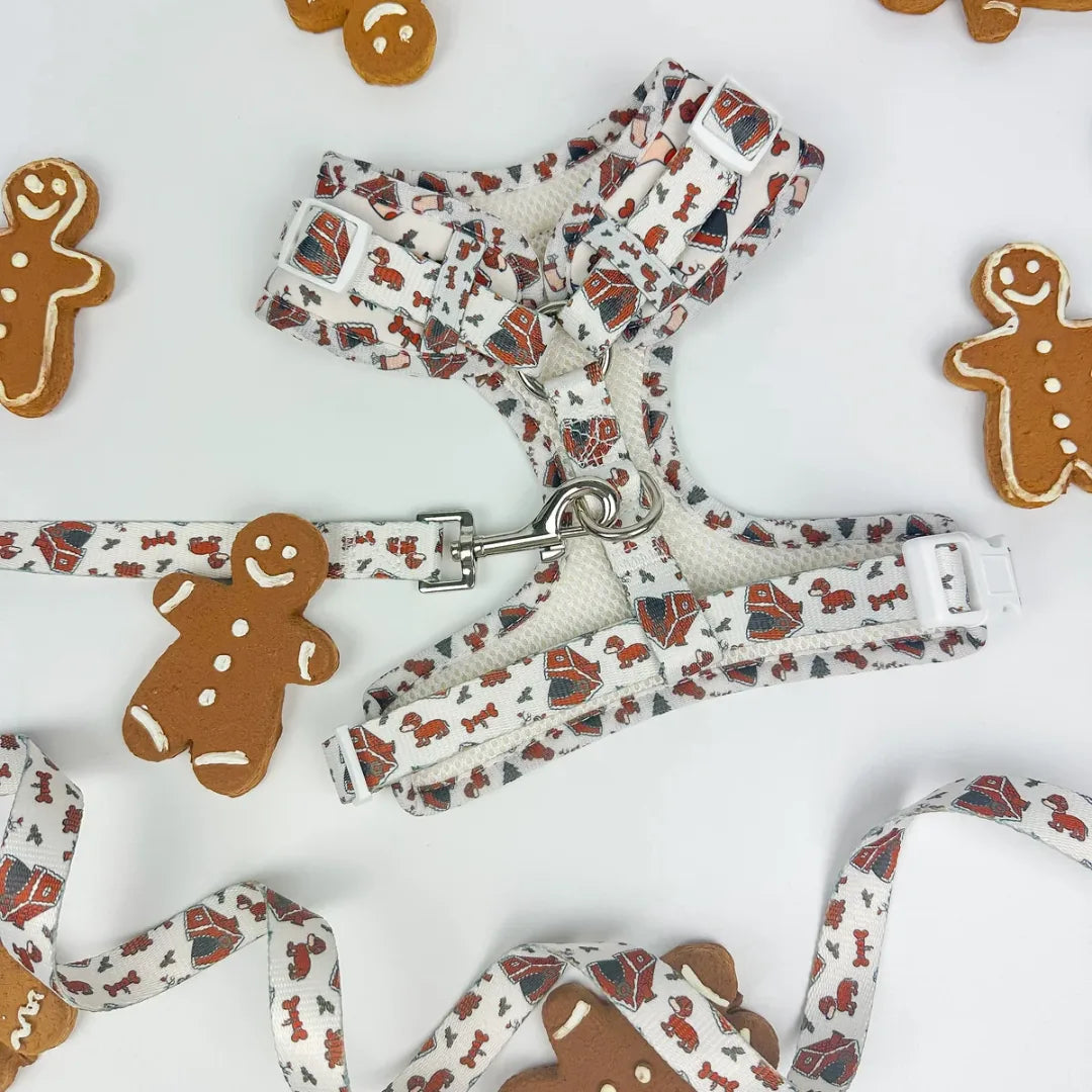 Adjustable dog harness with a festive gingerbread pattern, featuring breathable neoprene and easy-to-use buckles.