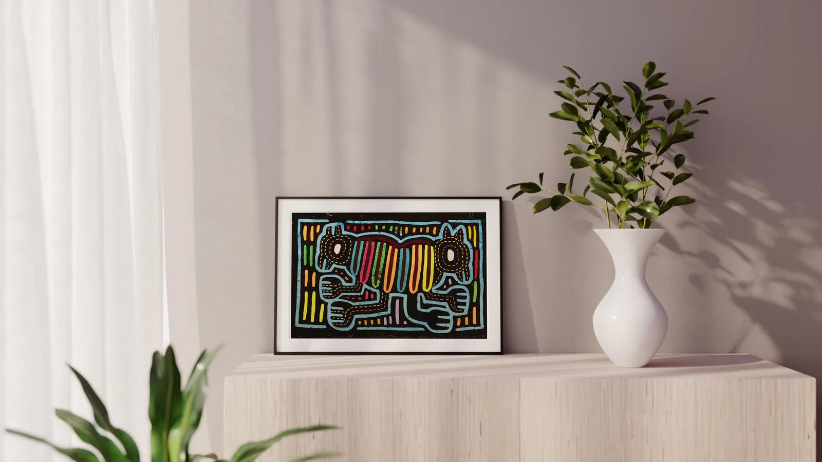 Hand-stitched Mola tapestry featuring vibrant colors and geometric patterns depicting two dogs, displayed on a light woode...