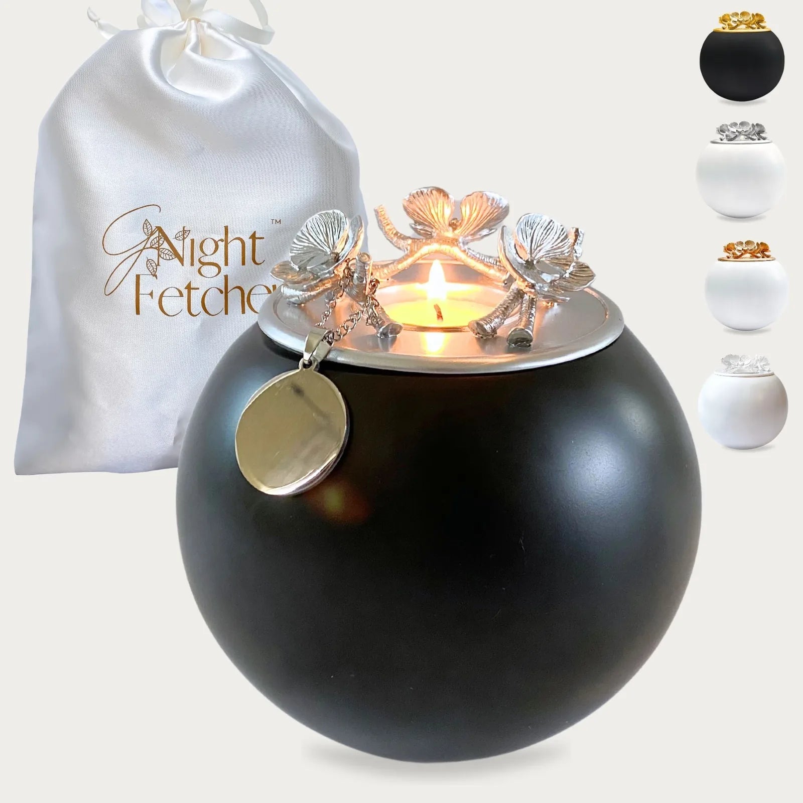 Handmade black orchid urn for pet ashes, featuring silver floral accents and a polished lid, accompanied by a GNight Fetch...
