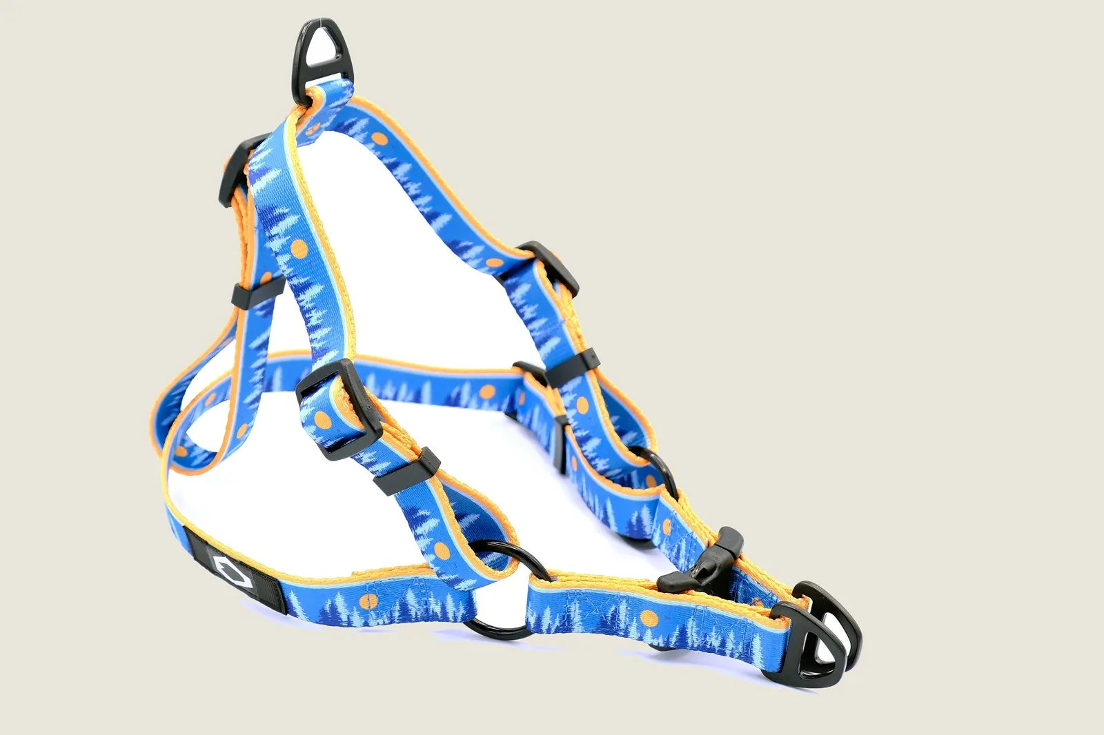 Frozen Forest nylon dog harness in blue with orange accents, featuring adjustable straps and secure YKK buckle.