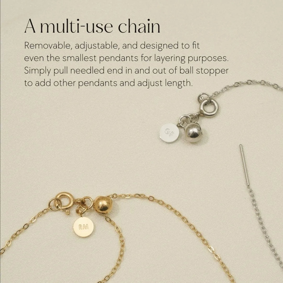 Adjustable multi-use jewelry chain featuring a gold and silver finish, designed for layering with various pendants.