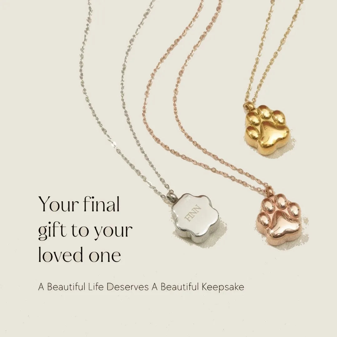 Delicate paw print necklaces in silver, rose gold, and gold with personalized engraving option, ideal for pet memorials.