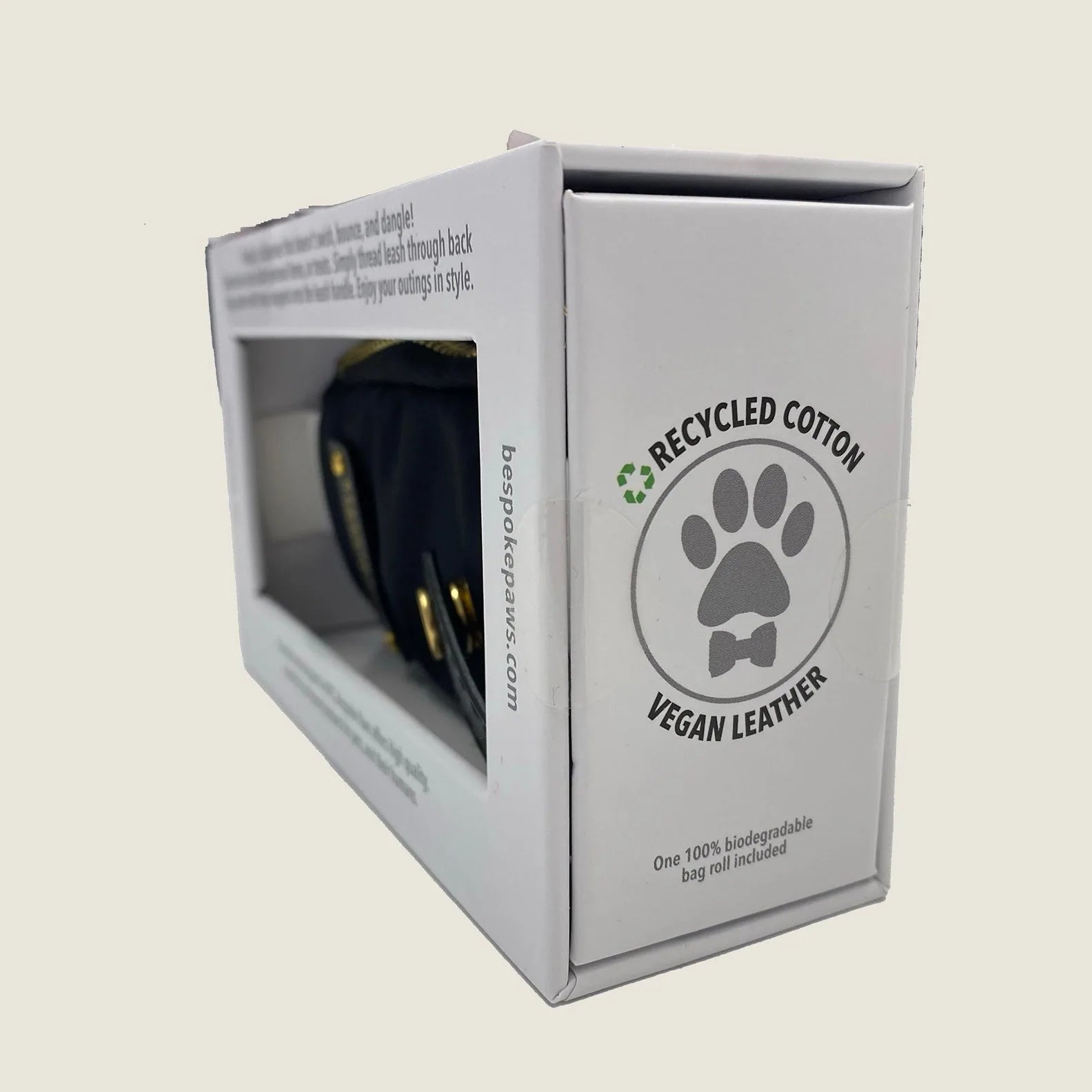 Black Pawsh Pouch waste bag dispenser with vegan leather accents and recycled cotton, displayed in its packaging.