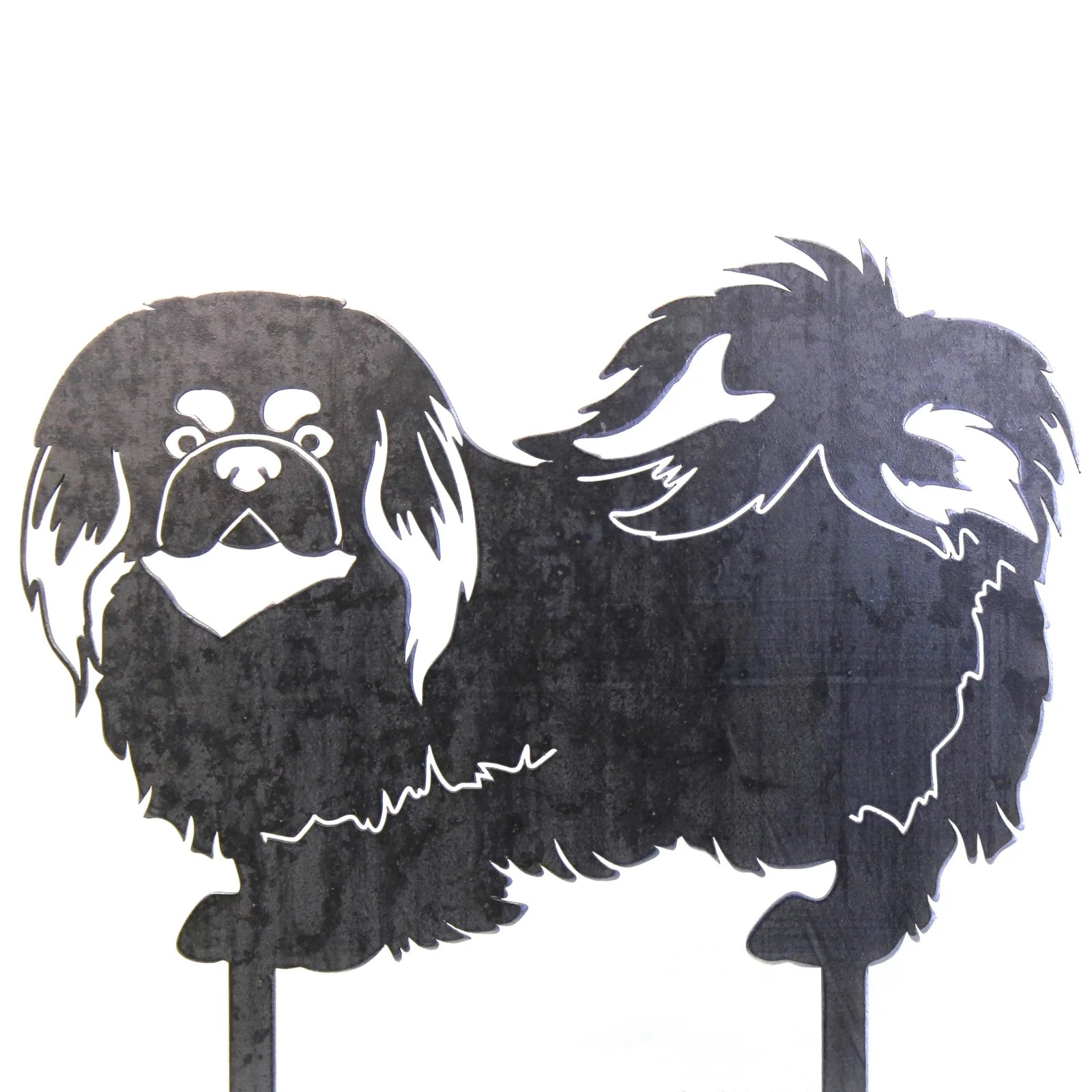 Handcrafted black metal silhouette of a Pekingese dog, featuring detailed fur and facial features, ideal for outdoor decor.