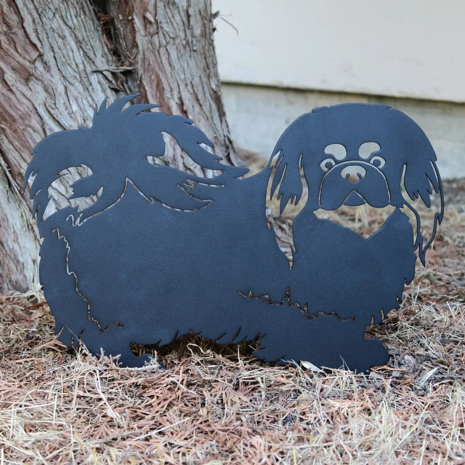 Black Pekingese metal silhouette by My Metal Rescue, showcasing intricate details and a weather-resistant design.