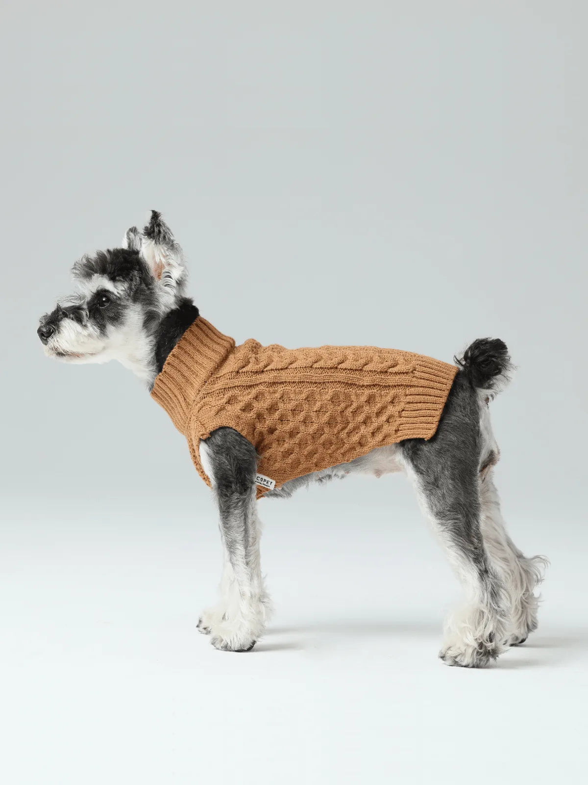 Cozy toffee orange dog sweater vest in knit design, featuring stretchable openings for easy wear.