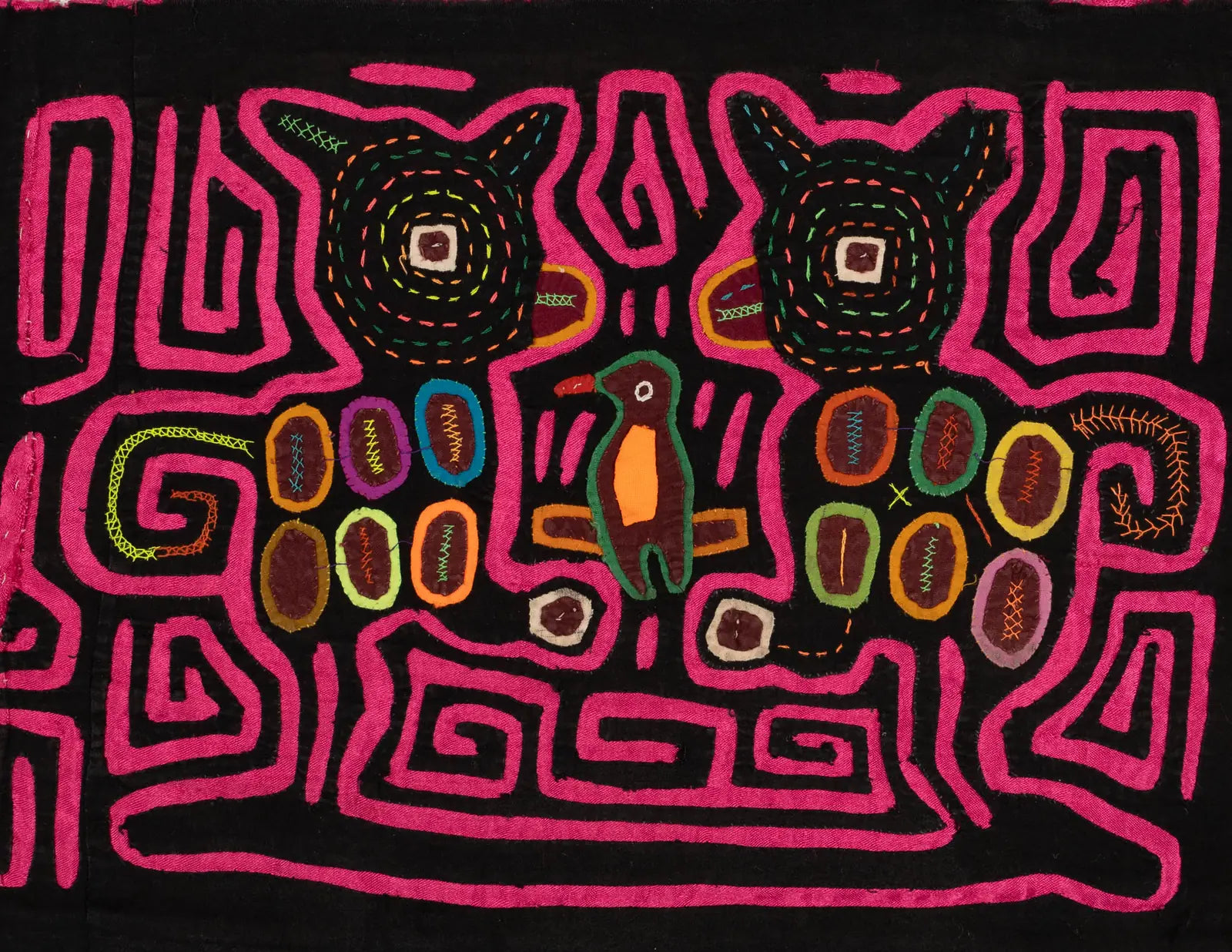 Hand-stitched pink and black Mola featuring geometric designs of animals and vibrant colors by Panamanian artisans.
