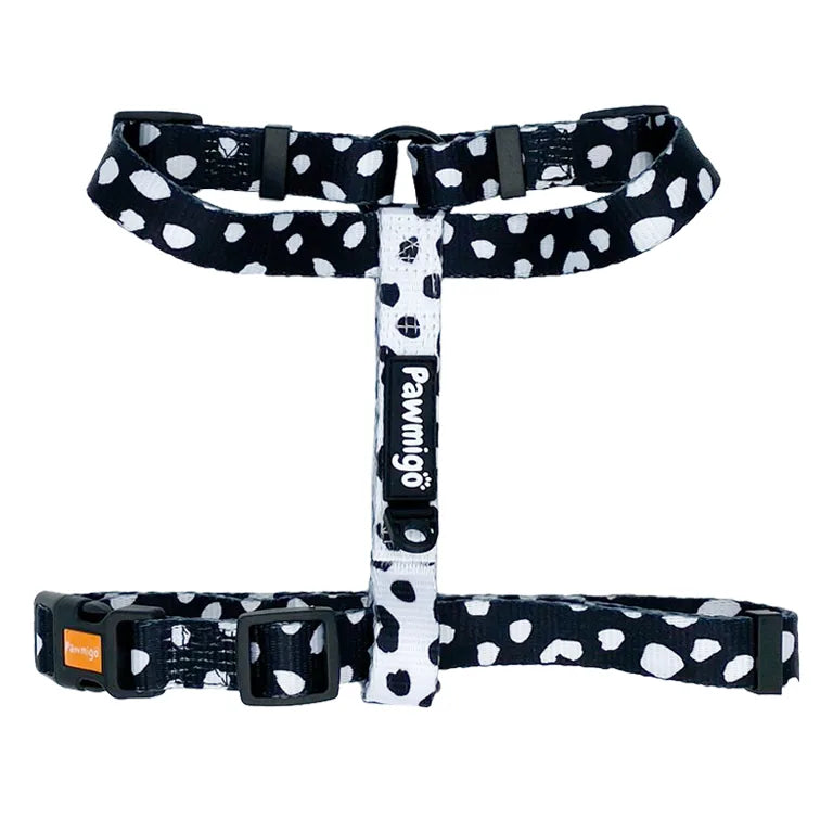 Polka dot harness in black and white, featuring adjustable straps and a sturdy D-ring for secure leash attachment.