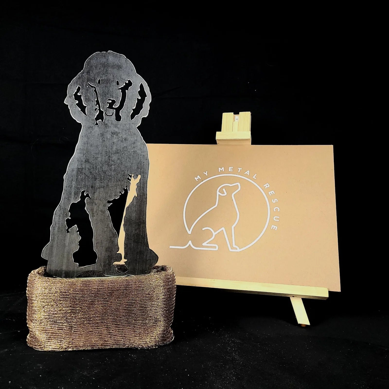 Handmade metal silhouette of a poodle in weathered Corten steel, displayed with a 'My Metal Rescue' logo background.