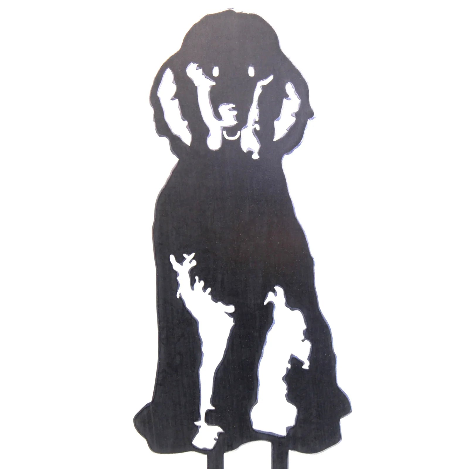 Black metal silhouette of a poodle dog, designed for outdoor decor, showcasing intricate cut-out details.