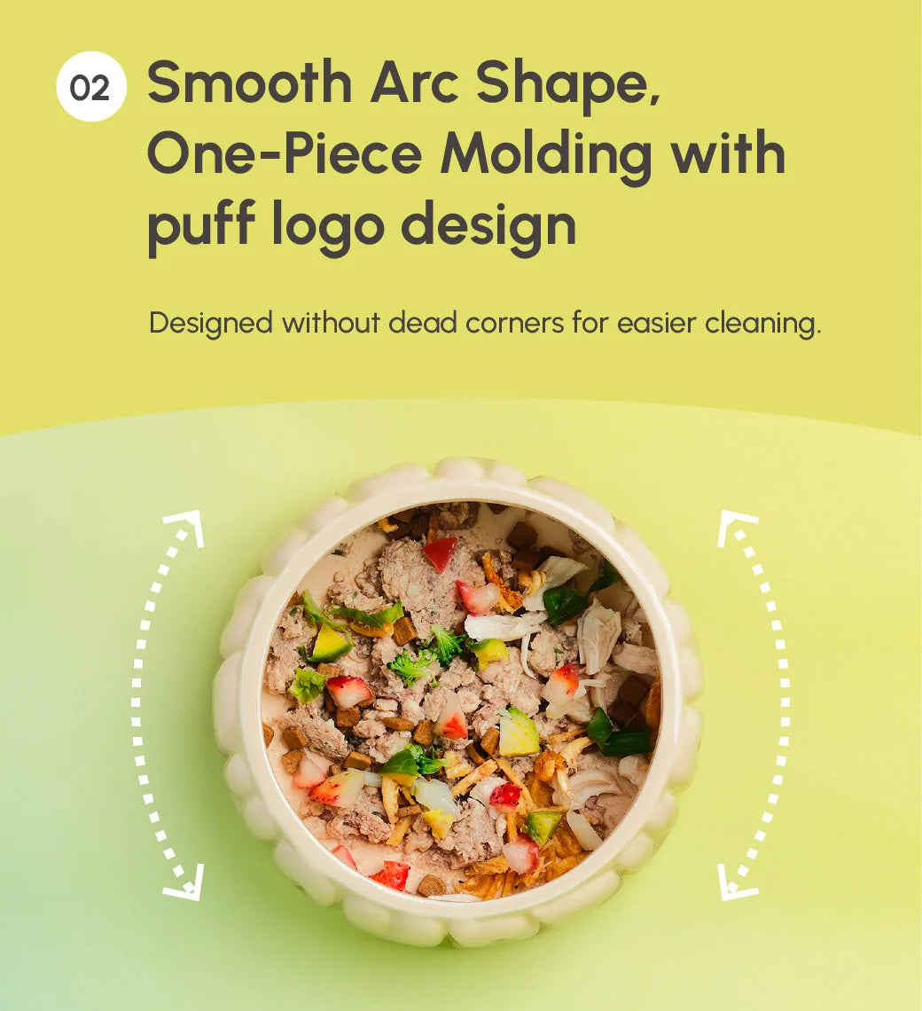 Gradient olive ceramic pet bowl featuring a smooth arc shape, puff logo design, and filled with pet food.