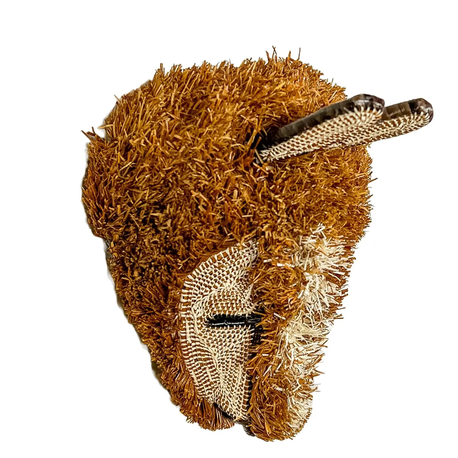 Handwoven brown puppy dog mask with textured fur and intricate details, made using traditional techniques by Indigenous ar...