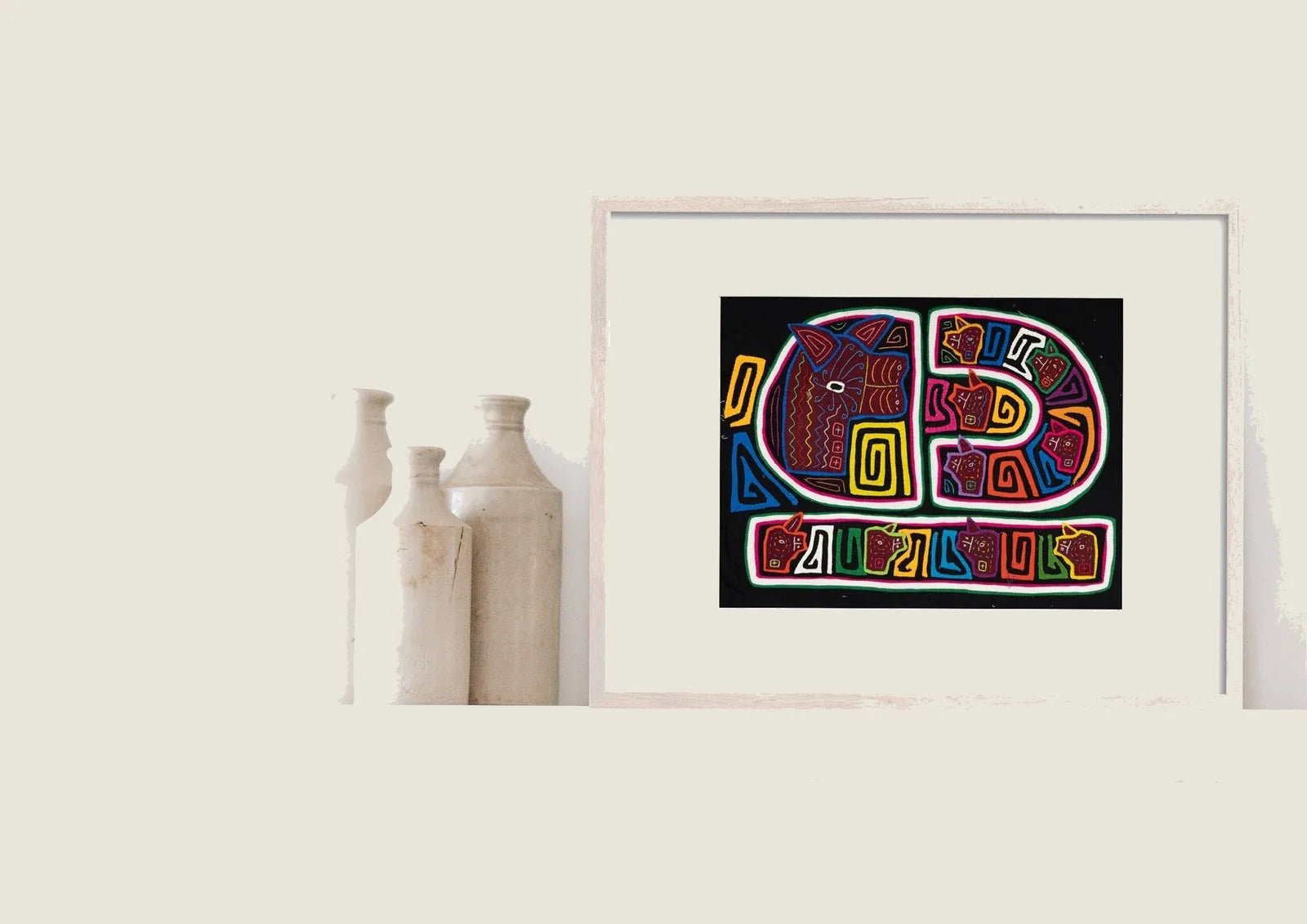 Colorful hand-stitched Mola featuring vibrant geometric designs of dogs on a black background.