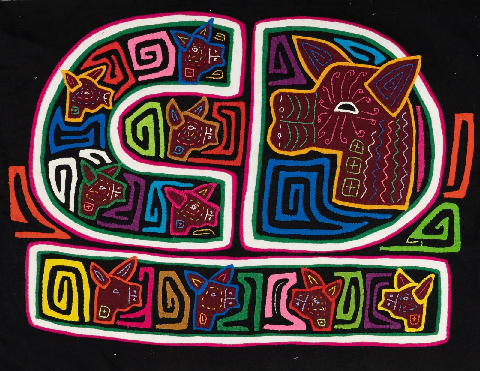 Colorful hand-stitched tapestry featuring geometric dog motifs on a black background, showcasing vibrant textile art.